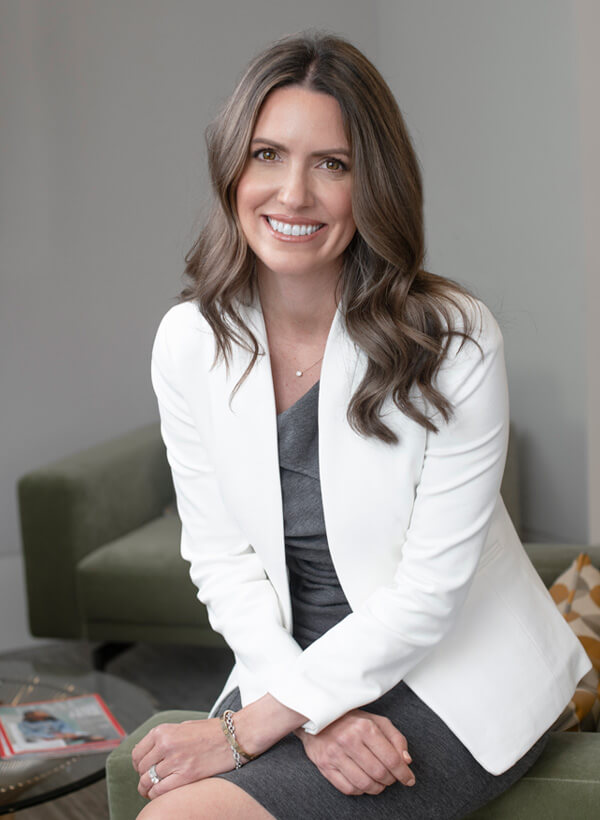 Professional Headshots Example of a Female Executive in a White Blazer In-office Photography By Dena Rafte
